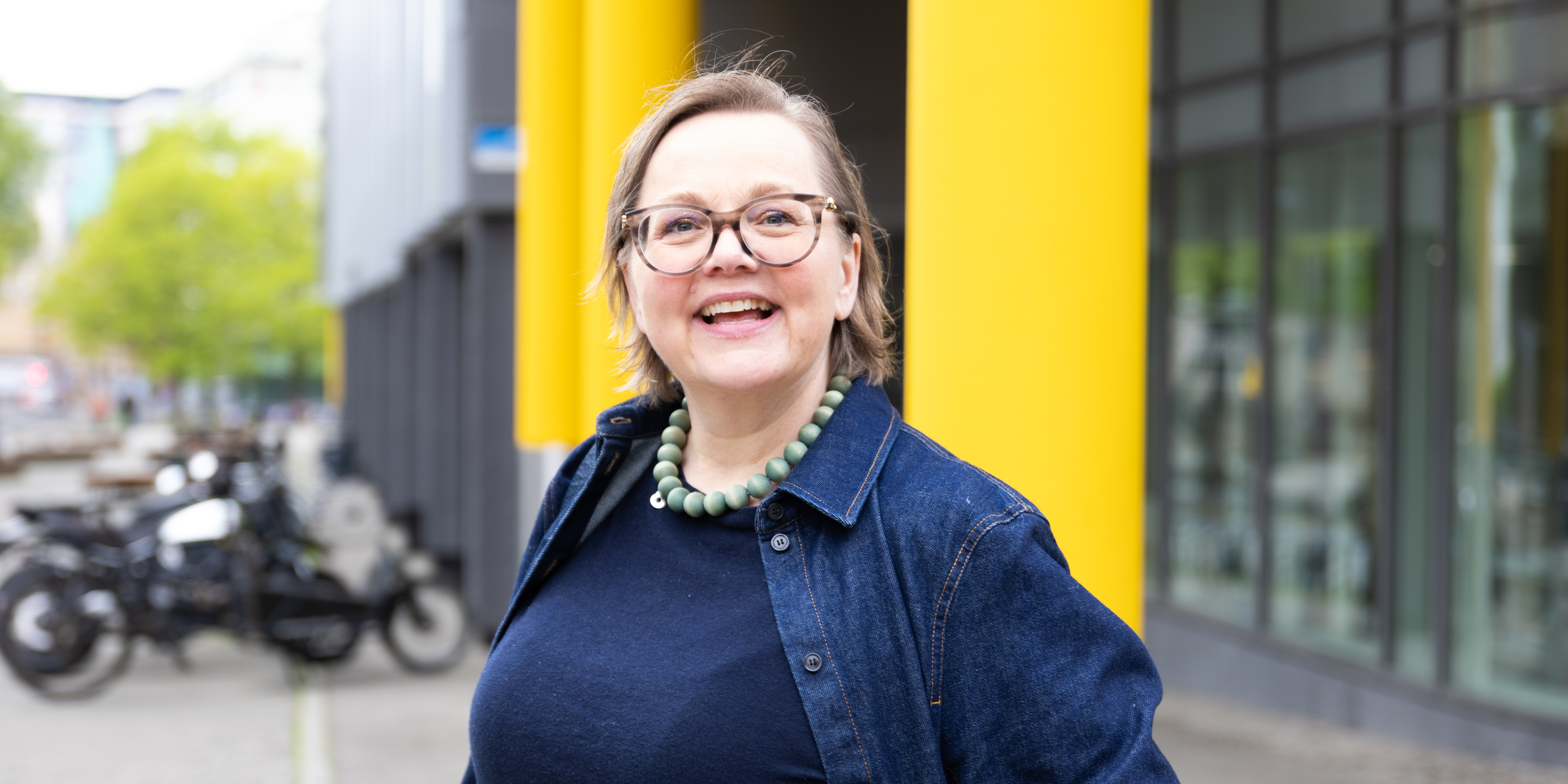 Ellen Nygard smiles for the camera outside Pilestredet 35.